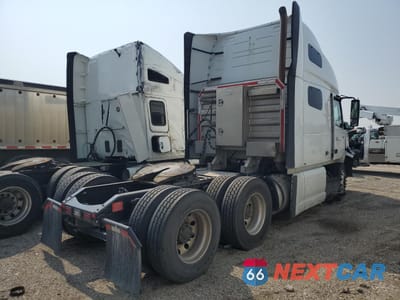 Czwarte zdjęcie samochodu z boku: 2021 VOLVO VN VNL VIN:4V4NC9EHXMN269071 - miniatura