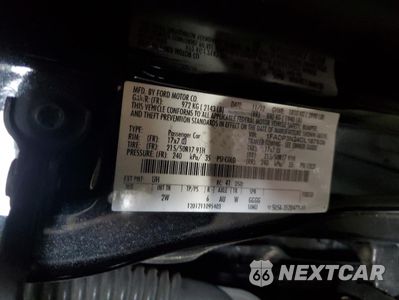 Zdjęcie 12 z 14 samochodu: 2013 FORD FOCUS TITANIUM VIN:1FADP3N24DL187939 - miniatura