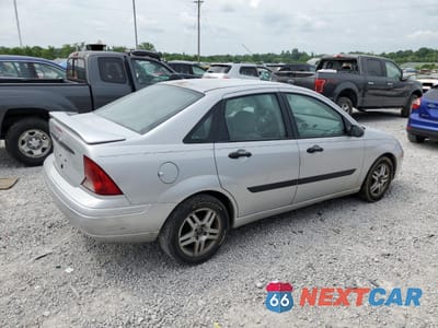 Trzecie zdjęcie samochodu z tyłu: 2002 FORD FOCUS LX VIN:1FAFP33P72W253645 - miniatura