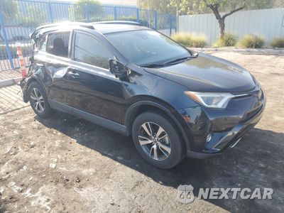 Czwarte zdjęcie samochodu z boku: 2018 TOYOTA RAV4 ADVENTURE VIN:JTMWFREV7JD130465 - miniatura