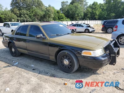 Czwarte zdjęcie samochodu z boku: 2010 FORD CROWN VICTORIA POLICE INTERCEPTOR VIN:2FABP7BV1AX139245 - miniatura