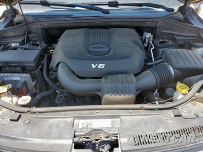 Zdjęcie 12 z 14 samochodu: 2014 JEEP GRAND CHEROKEE OVERLAND VIN:1C4RJECG9EC522061 - miniatura