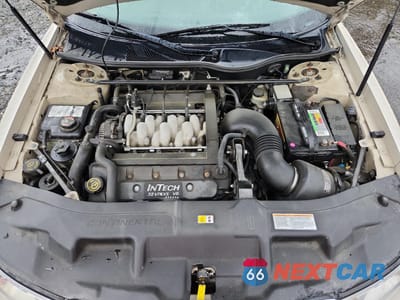 Zdjęcie 11 z 12 samochodu: 2000 LINCOLN CONTINENTAL VIN:1LNHM97V2YY764261 - miniatura