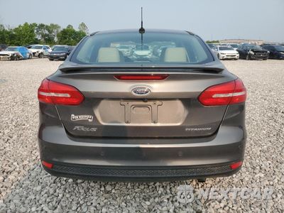 Zdjęcie 6 z 14 samochodu: 2018 FORD FOCUS TITANIUM VIN:1FADP3J22JL280959 - miniatura