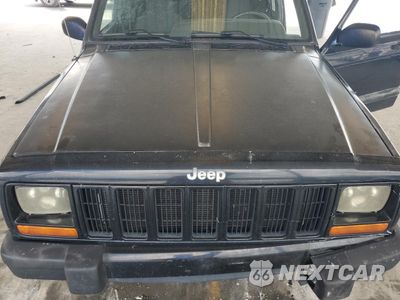 Zdjęcie 11 z 12 samochodu: 2001 JEEP CHEROKEE SPORT VIN:1J4FF48S21L593568 - miniatura