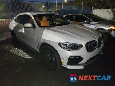 Czwarte zdjęcie samochodu z boku: 2020 BMW X4 XDRIVE30I VIN:5UX2V1C08L9C48350 - miniatura