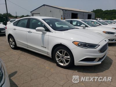 Czwarte zdjęcie samochodu z boku: 2018 FORD FUSION SE HYBRID VIN:3FA6P0LU7JR172067 - miniatura