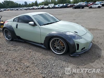 Czwarte zdjęcie samochodu z boku: 2005 NISSAN 350Z COUPE VIN:JN1AZ34D75M604558 - miniatura