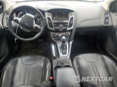 Zdjęcie 8 z 12 samochodu: 2012 FORD FOCUS TITANIUM VIN:1FAHP3J2XCL289073 - miniatura
