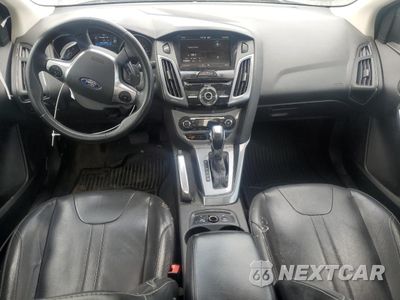 Zdjęcie 8 z 12 samochodu: 2012 FORD FOCUS TITANIUM VIN:1FAHP3J2XCL289073 - miniatura