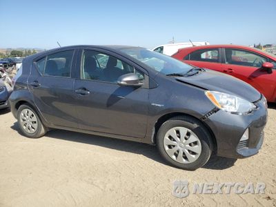 Czwarte zdjęcie samochodu z boku: 2013 TOYOTA PRIUS C VIN:JTDKDTB32D1538396 - miniatura