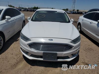 Piąte zdjęcie samochodu w środku: 2017 FORD FUSION SE HYBRID VIN:3FA6P0LU0HR409136 - miniatura