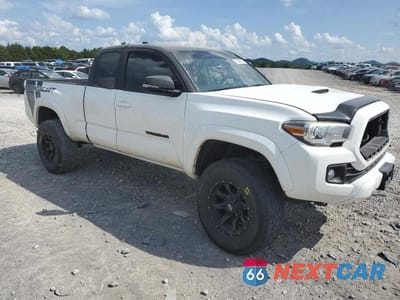 Czwarte zdjęcie samochodu z boku: 2016 TOYOTA TACOMA ACCESS CAB VIN:5TFSZ5AN0GX040456 - miniatura