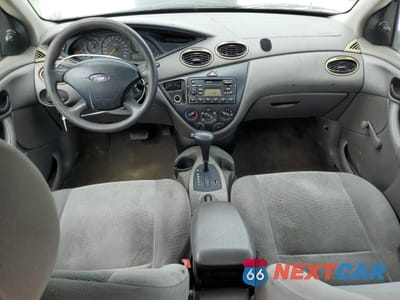 Zdjęcie 8 z 14 samochodu: 2002 FORD FOCUS LX VIN:1FAFP33P72W253645 - miniatura