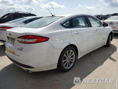 Trzecie zdjęcie samochodu z tyłu: 2017 FORD FUSION SE HYBRID VIN:3FA6P0LU5HR409259 - miniatura