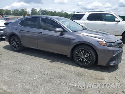 Czwarte zdjęcie samochodu z boku: 2024 TOYOTA CAMRY SE NIGHT SHADE VIN:4T1G11AKXRU211435 - miniatura