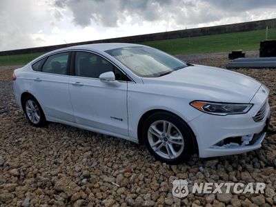 Czwarte zdjęcie samochodu z boku: 2018 FORD FUSION SE HYBRID VIN:3FA6P0LU3JR118636 - miniatura