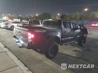 Trzecie zdjęcie samochodu z tyłu: 2021 TOYOTA TACOMA DOUBLE CAB VIN:3TMCZ5AN4MM447301 - miniatura
