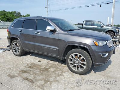 Czwarte zdjęcie samochodu z boku: 2017 JEEP GRAND CHEROKEE OVERLAND VIN:1C4RJFCG3HC791649 - miniatura