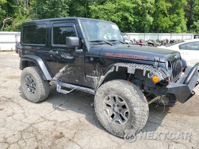 Czwarte zdjęcie samochodu z boku: 2013 JEEP WRANGLER RUBICON VIN:1C4HJWCG3DL561390 - miniatura