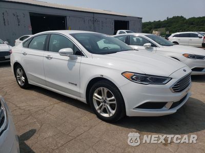 Czwarte zdjęcie samochodu z boku: 2018 FORD FUSION SE HYBRID VIN:3FA6P0LU8JR171977 - miniatura