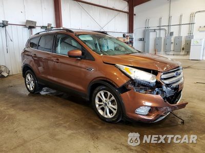 Czwarte zdjęcie samochodu z boku: 2017 FORD ESCAPE SE VIN:1FMCU9GD7HUA37707 - miniatura