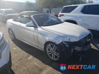 Czwarte zdjęcie samochodu z boku: 2016 BMW 228 I SULEV VIN:WBA1K9C5XGV322634 - miniatura