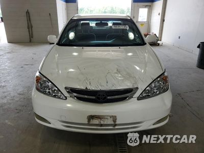 Piąte zdjęcie samochodu w środku: 2004 TOYOTA CAMRY LE VIN:JTDBE32K740281651 - miniatura