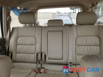 Zdjęcie 10 z 13 samochodu: 2003 LEXUS LX 470 VIN:JTJHT00WX33534413 - miniatura