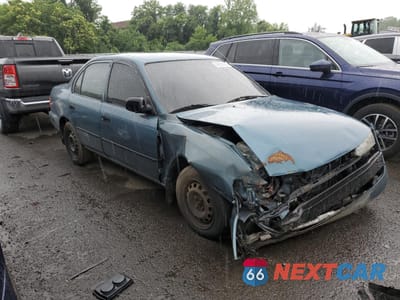 Czwarte zdjęcie samochodu z boku: 1995 TOYOTA COROLLA LE VIN:2T1AE09B2SC124256 - miniatura