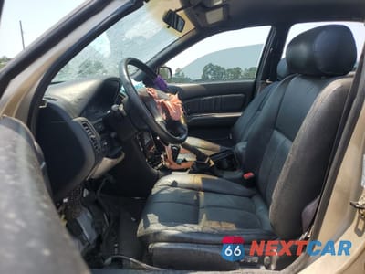 Zdjęcie 7 z 14 samochodu: 1997 NISSAN MAXIMA GLE VIN:JN1CA21D0VT853868 - miniatura