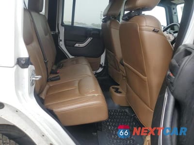 Zdjęcie 11 z 14 samochodu: 2015 JEEP WRANGLER UNLIMITED SAHARA VIN:1C4HJWEG6FL561285 - miniatura