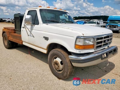 Czwarte zdjęcie samochodu z boku: 1997 FORD F350 VIN:3FEKF37F4VMA67182 - miniatura