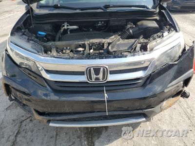 Zdjęcie 11 z 14 samochodu: 2020 HONDA PILOT EXL VIN:5FNYF6H53LB033083 - miniatura
