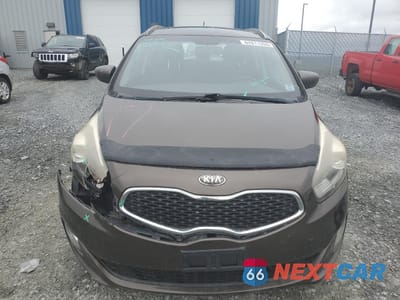 Piąte zdjęcie samochodu w środku: 2014 KIA RONDO VIN:KNAHT8A33E7018392 - miniatura