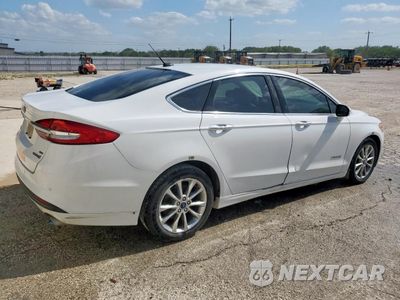Trzecie zdjęcie samochodu z tyłu: 2017 FORD FUSION SE HYBRID VIN:3FA6P0LUXHR408995 - miniatura