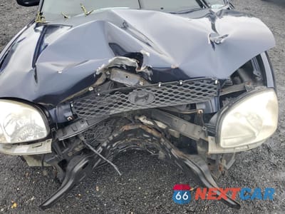 Zdjęcie 12 z 13 samochodu: 2004 HYUNDAI SANTA FE GLS VIN:KM8SC13E94U799011 - miniatura