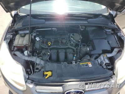 Zdjęcie 11 z 12 samochodu: 2014 FORD FOCUS S VIN:1FADP3E25EL176675 - miniatura