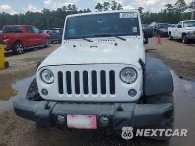 Piąte zdjęcie samochodu w środku: 2017 JEEP WRANGLER UNLIMITED SPORT VIN:1C4HJWDG0HL577258 - miniatura