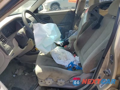 Zdjęcie 7 z 12 samochodu: 2003 HYUNDAI ELANTRA GLS VIN:KMHDN45D23U642542 - miniatura