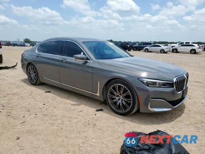 Czwarte zdjęcie samochodu z boku: 2021 BMW 740 I VIN:WBA7T2C07MCF41290 - miniatura