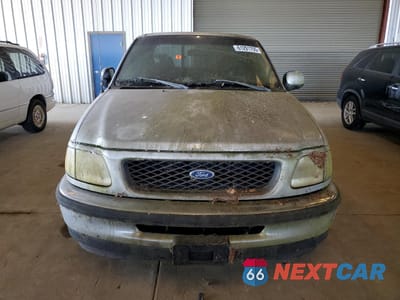 Piąte zdjęcie samochodu w środku: 1991 FORD F150 VIN:1FTDX1761WKA04620 - miniatura