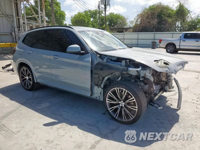 Czwarte zdjęcie samochodu z boku: 2022 BMW X3 SDRIVE30I VIN:5UX43DP00N9N42707 - miniatura