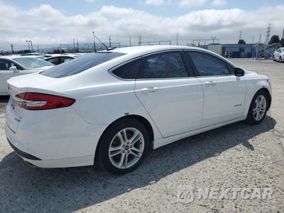 Trzecie zdjęcie samochodu z tyłu: 2018 FORD FUSION SE HYBRID VIN:3FA6P0LUXJR118679 - miniatura