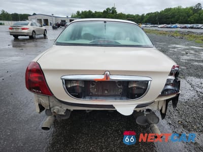 Zdjęcie 6 z 12 samochodu: 2000 LINCOLN CONTINENTAL VIN:1LNHM97V2YY764261 - miniatura