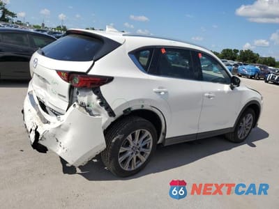 Trzecie zdjęcie samochodu z tyłu: 2020 MAZDA CX-5 GRAND TOURING VIN:JM3KFADM7L1859196 - miniatura