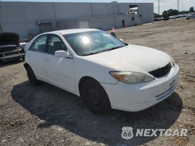 Czwarte zdjęcie samochodu z boku: 2002 TOYOTA CAMRY LE VIN:4T1BE32K32U016906 - miniatura
