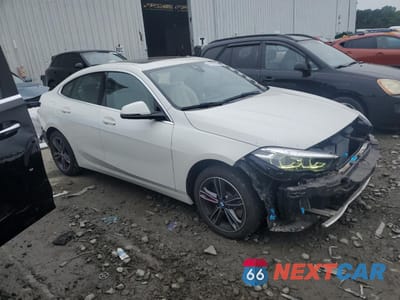 Czwarte zdjęcie samochodu z boku: 2021 BMW 228XI VIN:WBA73AK03M7J36254 - miniatura