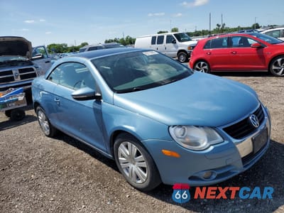 Czwarte zdjęcie samochodu z boku: 2010 VOLKSWAGEN EOS TURBO VIN:WVWBA7AH6AV011284 - miniatura