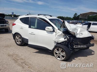 Czwarte zdjęcie samochodu z boku: 2012 HYUNDAI TUCSON GLS VIN:KM8JU3AC1CU353276 - miniatura